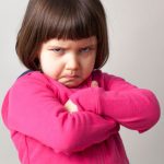 child with angry face