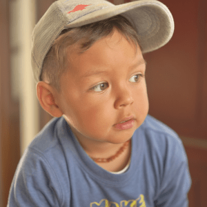 young boy with hat