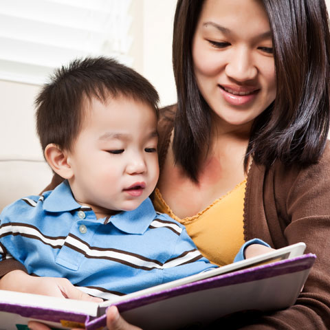 mother reading to child