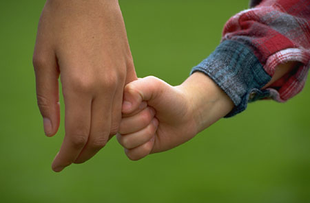 child holding hand